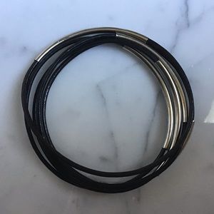 Black leather bracelet set with silver band